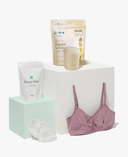The Pumping 101 Set • Save 10% is displayed on white blocks, featuring organic lactation latte powder, a full glass, breast pads, disposable pads, and a mauve pumping bra.
