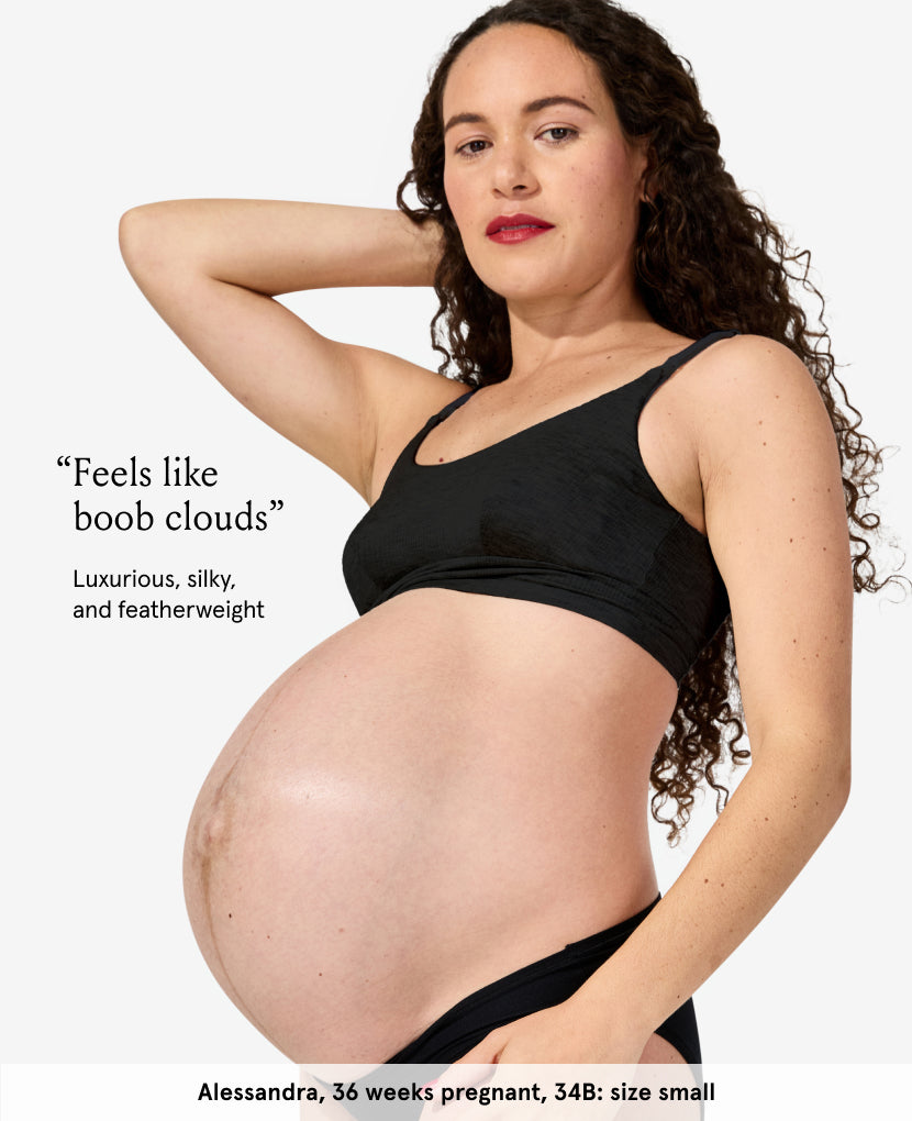 Pregnant model wearing a black nursing bra and matching bottoms, labeled as Alessandra, 36 weeks pregnant, 34B, size small. Shown in Black.
