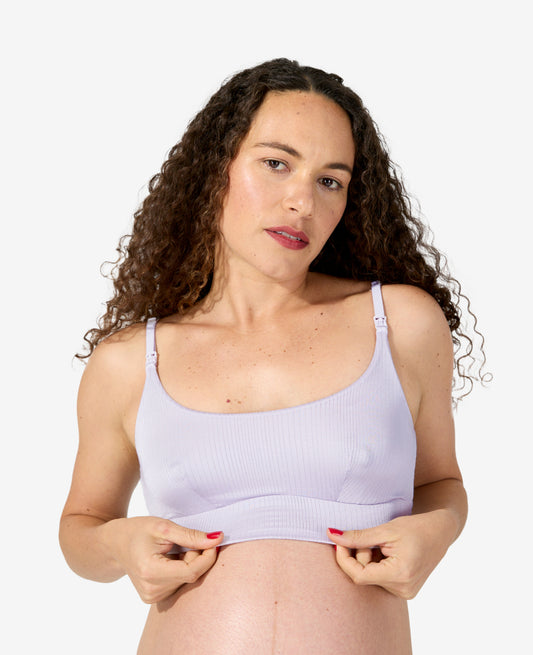 Designed to comfortably fit your body from maternity through every stage of breastfeeding and beyond. Alessandra is 36 weeks pregnant and wears a size S.