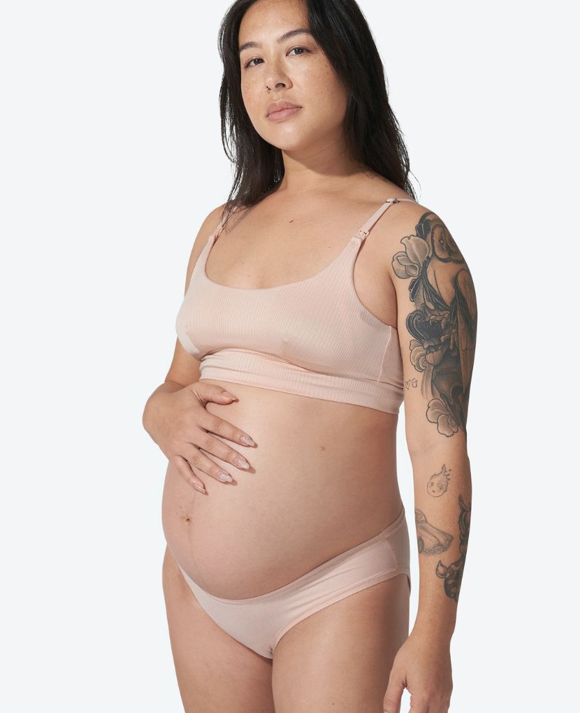 The Under the Belly Panty is perfect for pregnancy through postpartum, and beyond. Shown in Black/Clay.