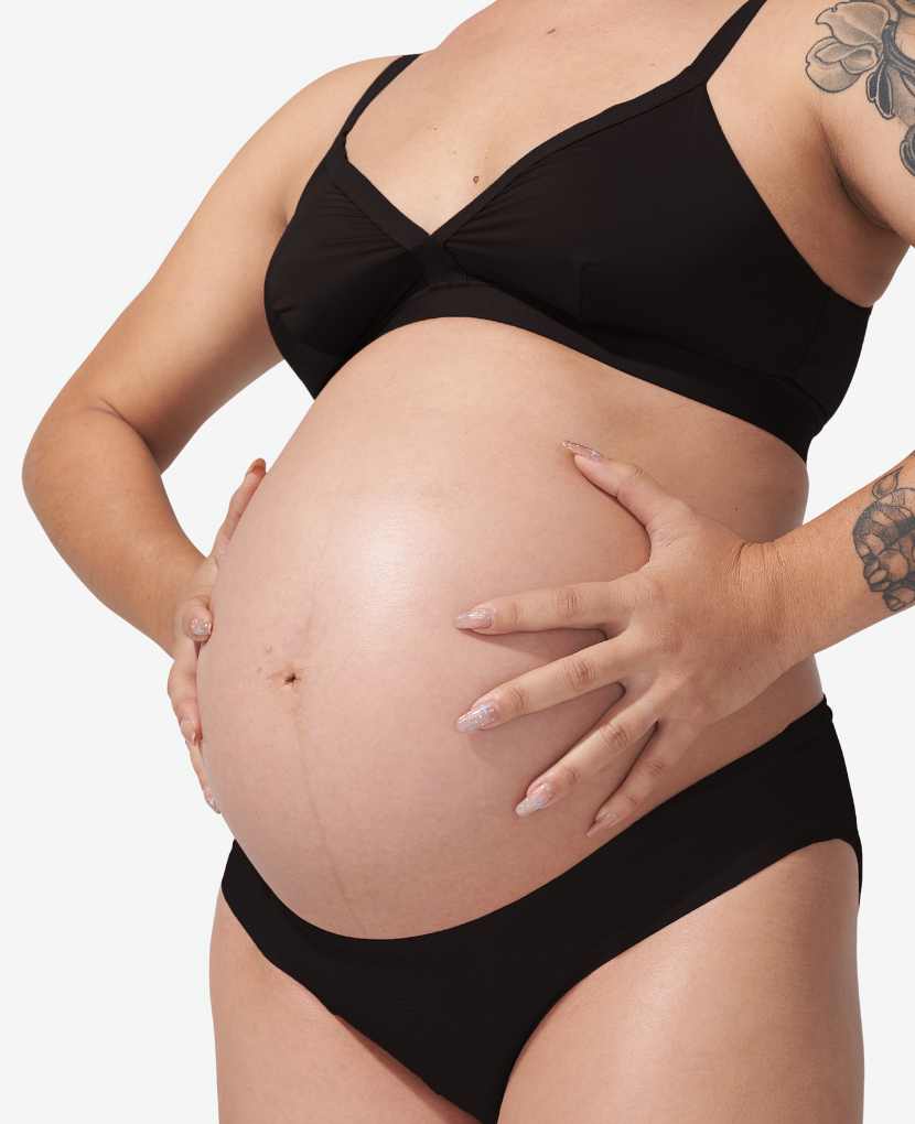 Meredith is in her third trimester, and is wearing size M. Shown in Black.