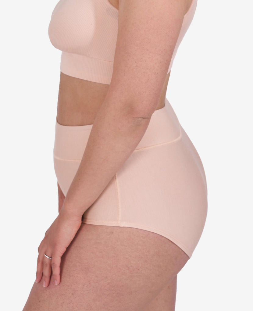 Super soft OEKO-TEX certified micromodal feels plush and gentle on sensitive skin. Melissa wears size Small in Clay.