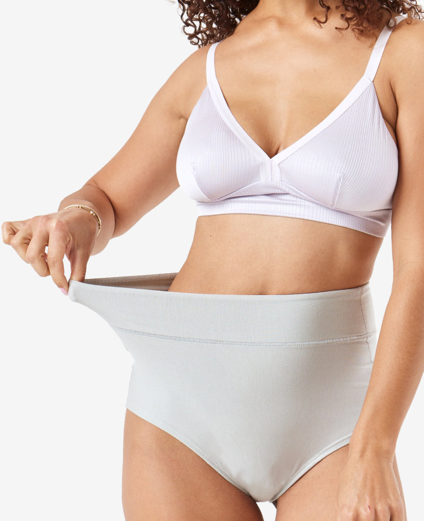Wide band elastic waist is high enough to stay put on your pregnancy bump or healing core while covering a C-section incision without rubbing. Shown in Black/Clay/Grey.