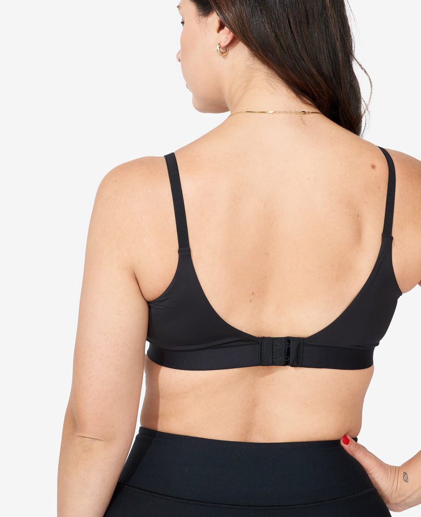 Our custom, signature five-row extended back closure offers increased adjustability. Melissa, 34B, wears size Small in Katherine x Bodily Black. 