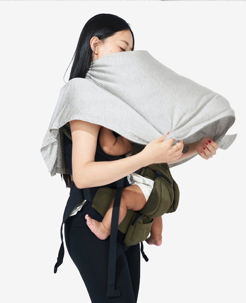 Light-as-a-feather, the Everything Cover in Grey Marl features breathable material that comfortably covers without overheating. Shown in Grey Marl.