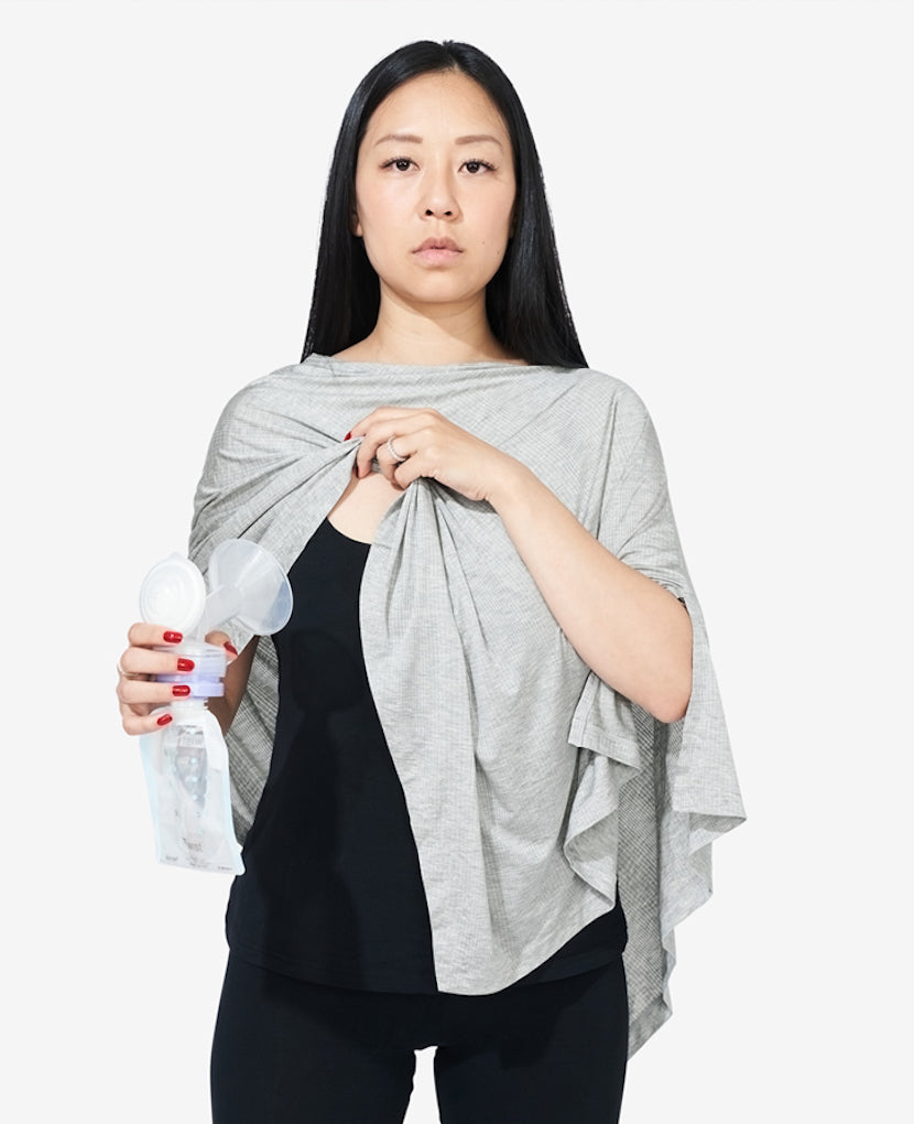 The Everything Cover features quick and easy pumping coverage with a stretchy neckline to easily make adjustments. Shown in Grey Marl.