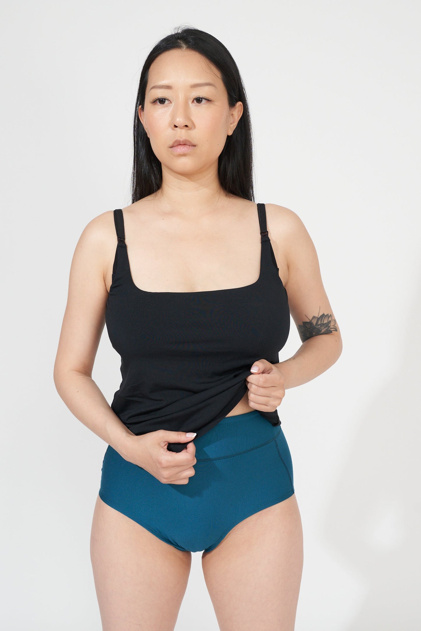 Ultra-stretchy in all the right places — from the waist to the inner thigh — to accommodate swelling and maternity & postpartum body fluctuations. Model is postpartum and wearing Pacific.