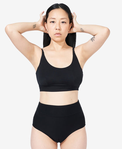 Ultra-stretchy OEKO-TEX fabric moves with your body and is incredibly soft on sensitive nipples and skin. Ara, size 34C, wears a S in Black.
