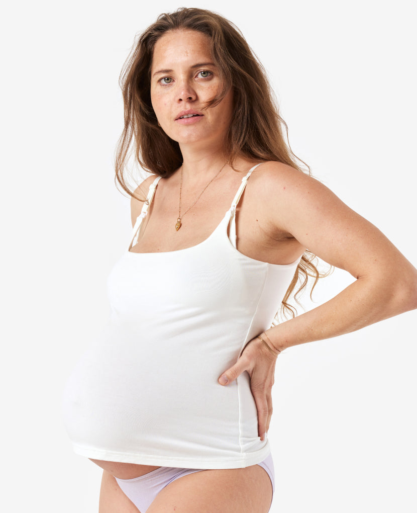 The Always-On Nursing Tank, in Chalk, is made of super soft and stretchy OEKO-TEX certified fabric, and moves with you as your body transforms through postpartum & breastfeeding.