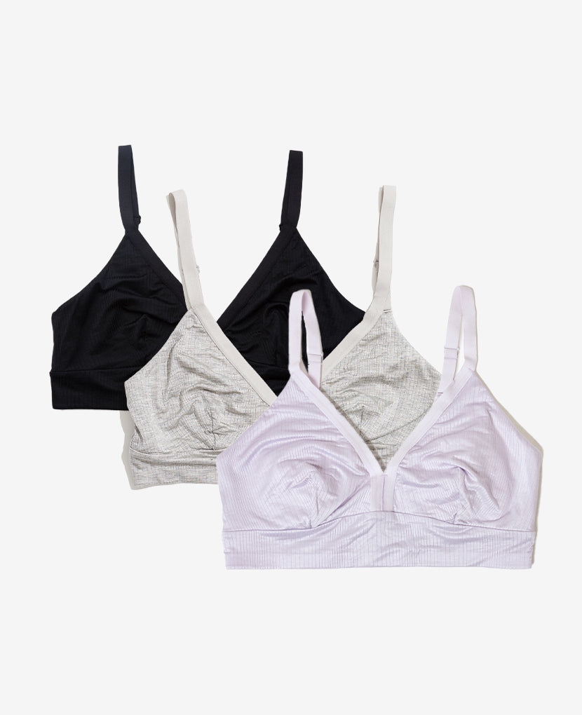 Create your combination of three Effortless Bras in Grey, Black, or Lavender Haze.
