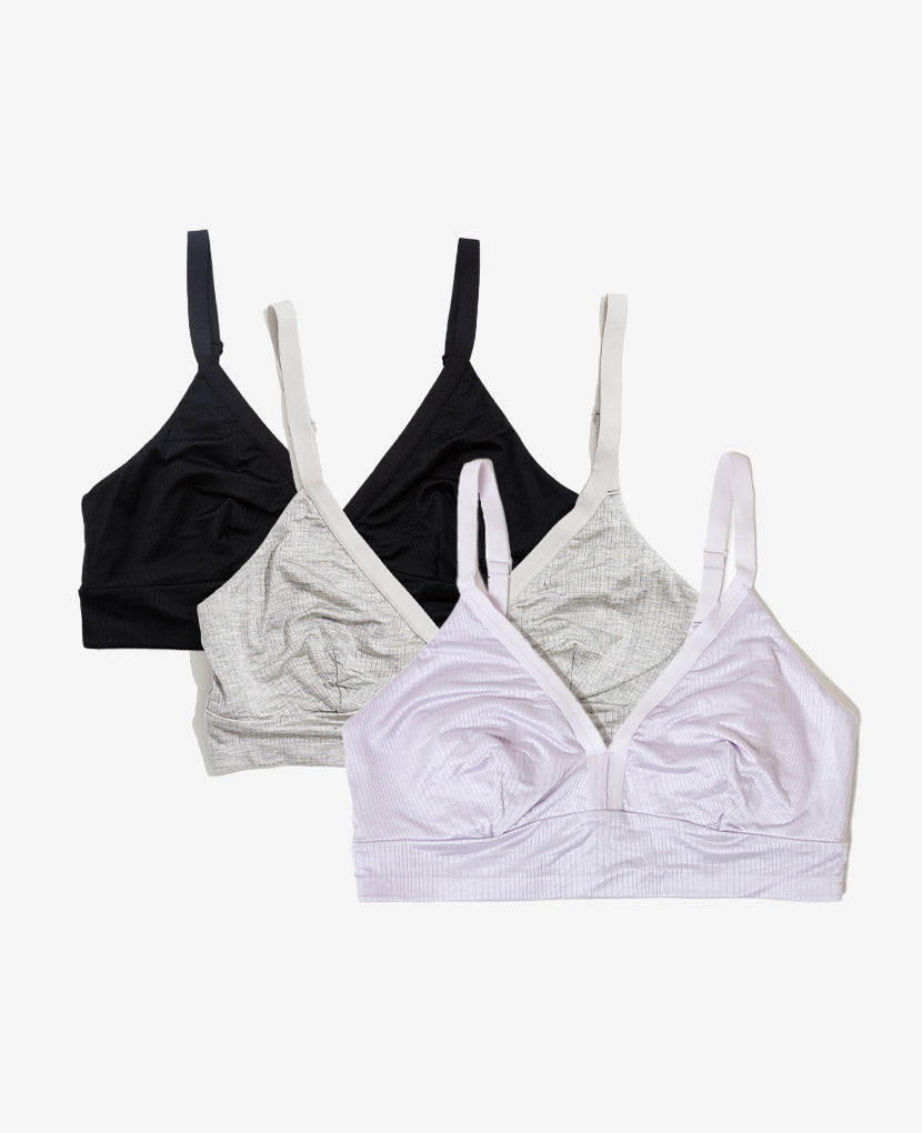 Create your combination of three Effortless Bras. Available in Grey, Clay, Black, or Lavender Haze.