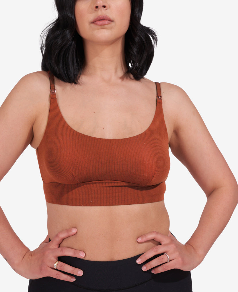Named “Most Comfortable Nursing Sleep Bra” by WhatToExpect, it was developed with an IBCLC to optimize breast health, even in Stage 1, when the risk is highest for breastfeeding complications. Melissa, 1 year postpartum, wears a S in Ember.
