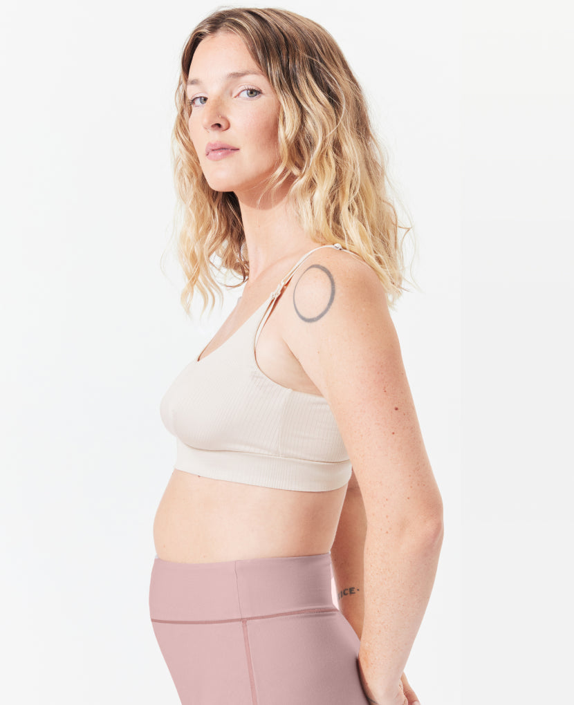 Named “Most Comfortable Nursing Sleep Bra” by WhatToExpect, it was developed with an IBCLC to optimize breast health, even in Stage 1, when the risk is highest for breastfeeding complications. Coco is 6 months postpartum and is wearing Moon.