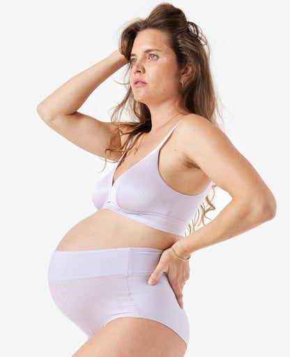 Designed to comfortably fit your body from pregnancy through every stage of breastfeeding and beyond. Available in Lavender Haze. 