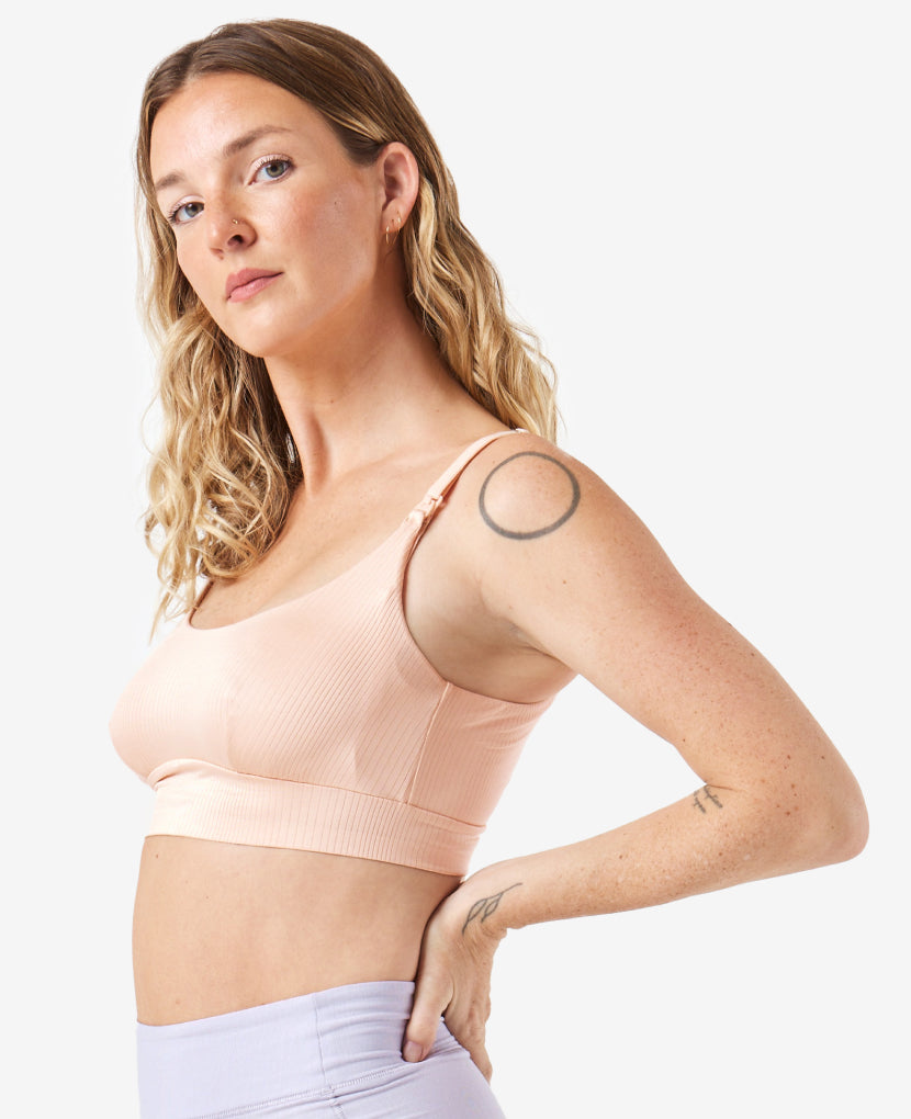 Named “Most Comfortable Nursing Sleep Bra” by WhatToExpect, it was developed with an IBCLC to optimize breast health, even in Stage 1, when the risk is highest for breastfeeding complications. Coco is 6 months postpartum. Shown in Clay.