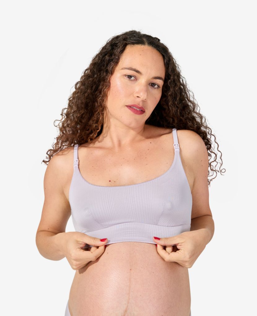 Designed to comfortably fit your body from maternity through every stage of breastfeeding and beyond. Alessandra is 36 weeks pregnant and wears a size S. Shown in Lavender Haze.