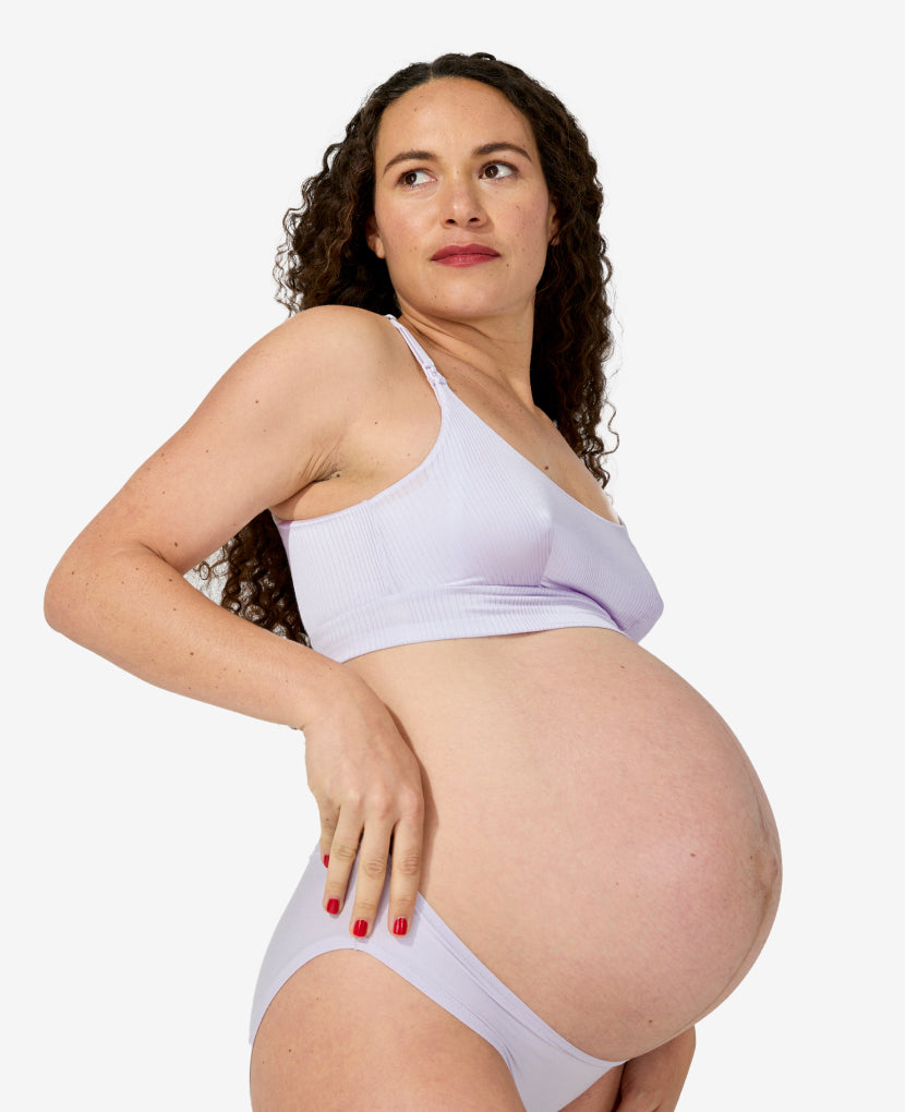 Ultra-stretchy fabric moves with your body and is incredibly soft on sensitive nipples and skin. Alessandra is 36 weeks pregnant and wears a size S. 