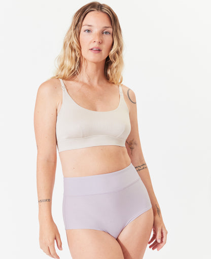 Support for pregnancy through postpartum – that you'll want to wear well beyond. Available in Black/Lavender Haze/Grey.