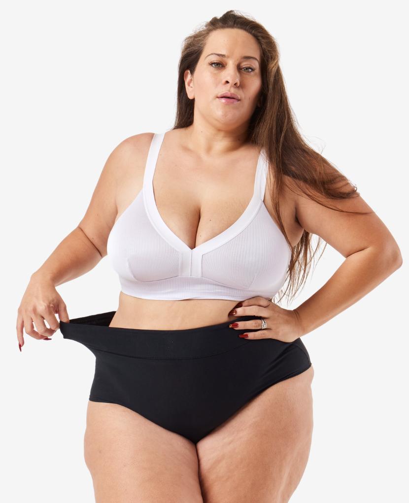 Comfortable high-waisted panty designed for pregnancy through postpartum – that you'll want to wear well beyond. Nicole wears size 2X. Shown in Black/Dusk/Slate.