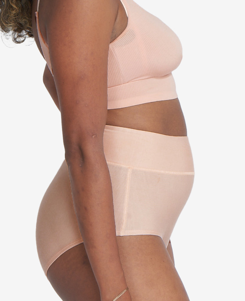 Wide band elastic waist is high enough to stay put a pregnancy bump or healing core while covering a C-section incision without rubbing. Shown in Black/Clay/Clay.