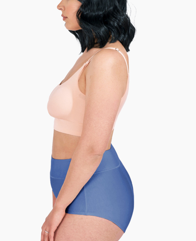 Craveably comfortable high-waisted support designed for pregnancy through postpartum – that you'll want to wear well beyond. Shown in Azule in size Small.