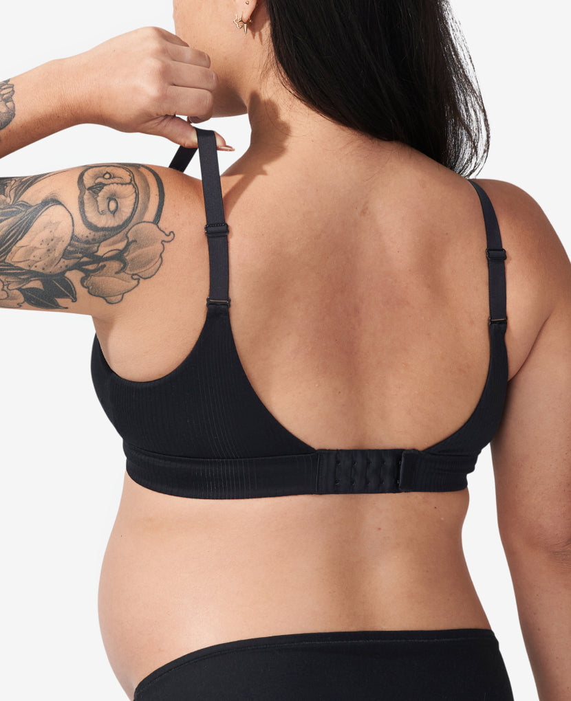 Our custom five-row back closure and slider straps accommodate your body’s incredible changes from pregnancy all the way through postpartum. Shown in Black.