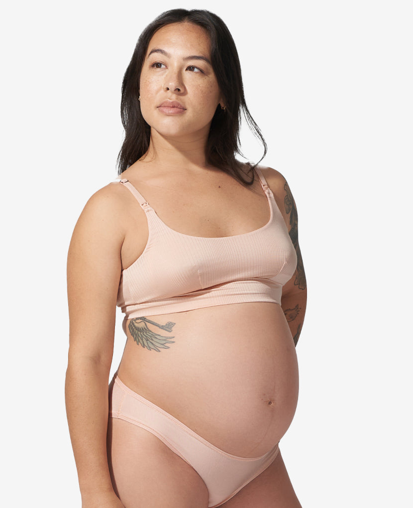 Named “Best Maternity Bra” by InStyle, this Stage 1 pregnancy-through-postpartum bra – with clip-down easy nursing access – is the ultimate in comfort. Alyssa, size 36B, wears a M in Clay.