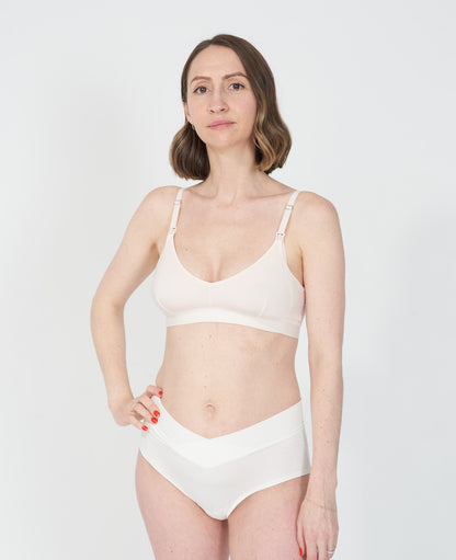 Buttery-soft material is light, smooth, and cool to the touch for added comfort on sensitive skin. Nora wears a S in Shell.