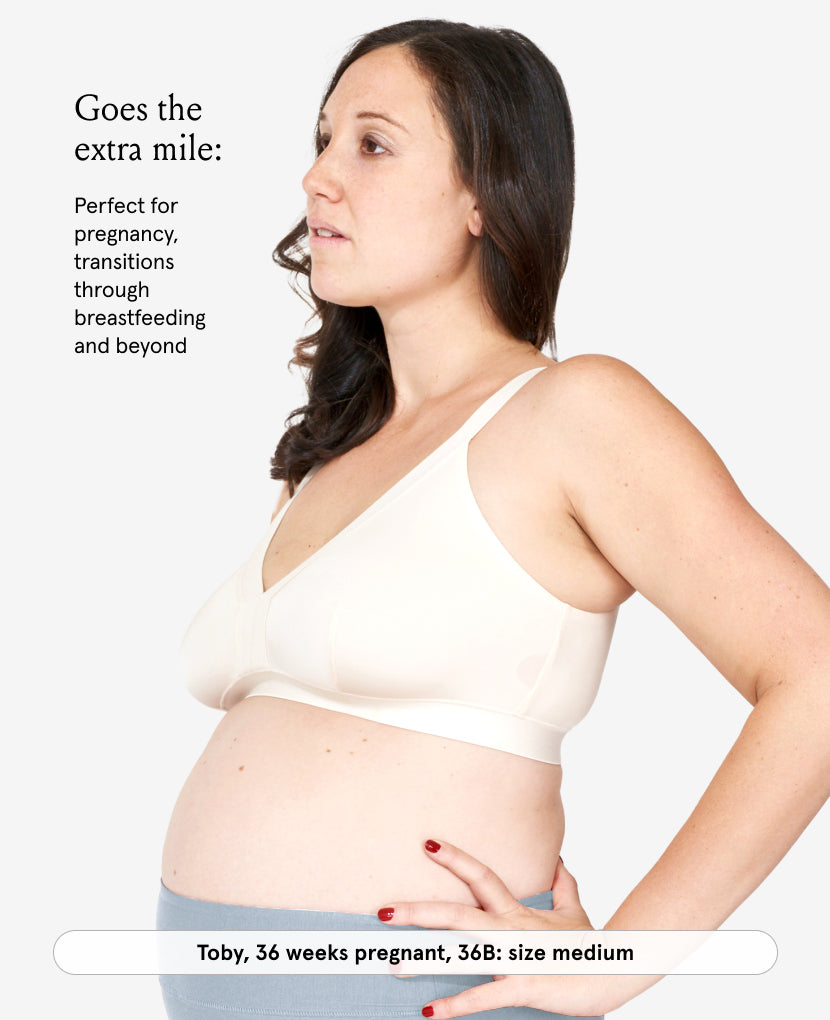Pregnant woman wearing a shell colored maternity bra with text about its use during pregnancy and breastfeeding.