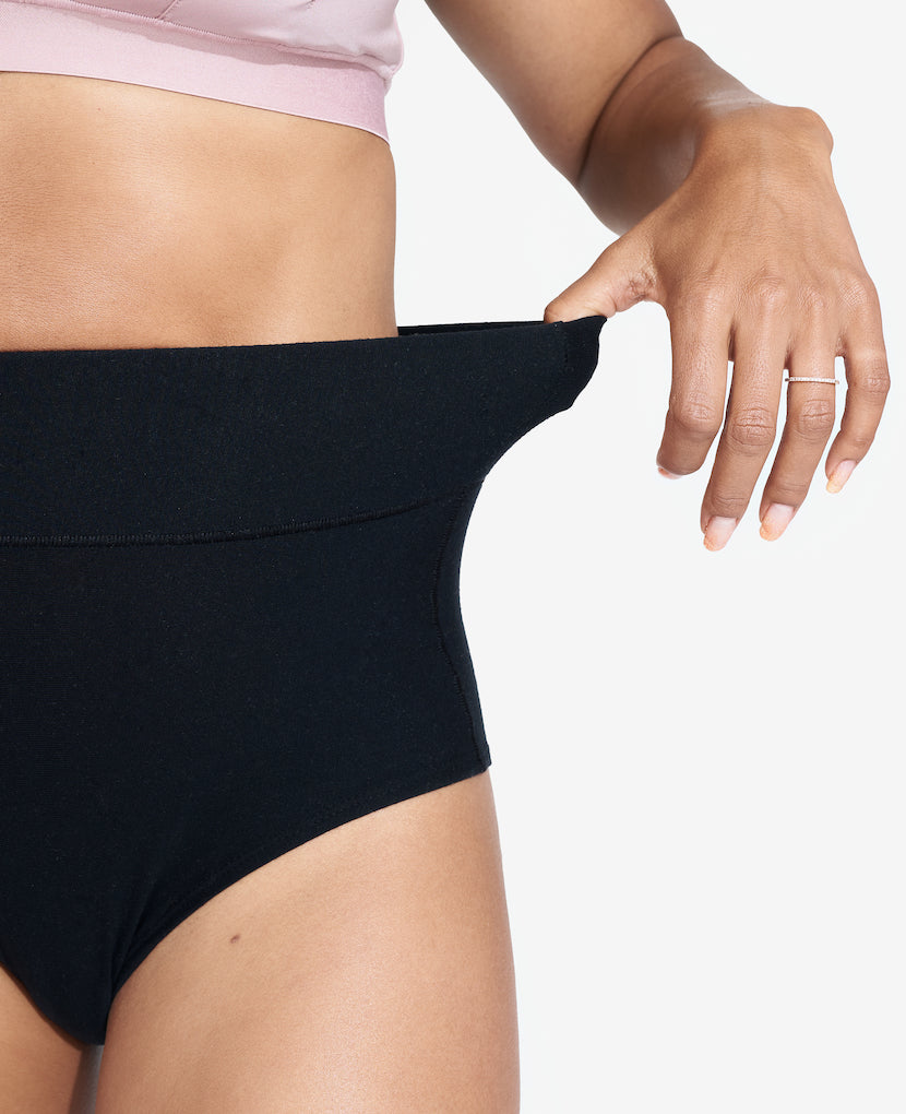 Ultra-soft, super stretchy and made from non-toxic OEKO-TEX certified micro-modal, our All-In Panty is designed to support your body through postpartum transitions — but you'll wear them well after. Available in Black/Ember/Grey.