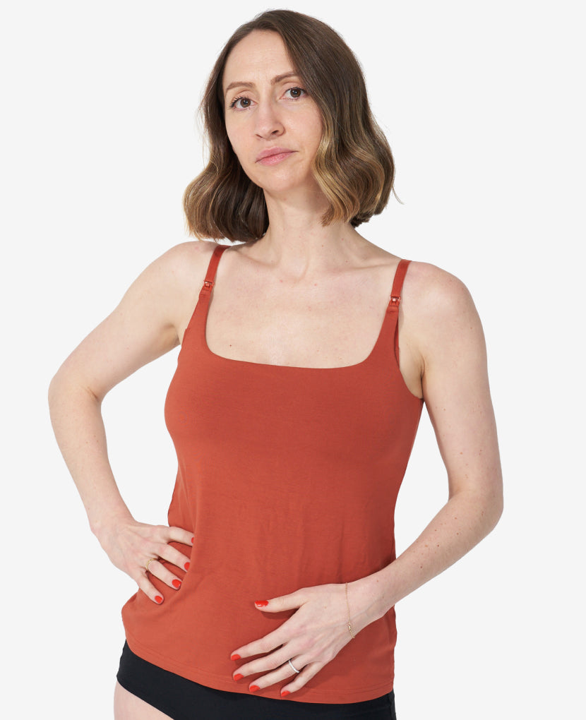 The Always-On Nursing Tank is your 24/7 go-to for easy feeding, maximum comfort, and modern styling. Shown in Ember.