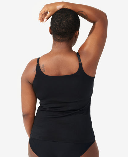 Adjustable straps accommodate fluctuations during postpartum. Savonne is a 36DD and wears size Medium in Black.