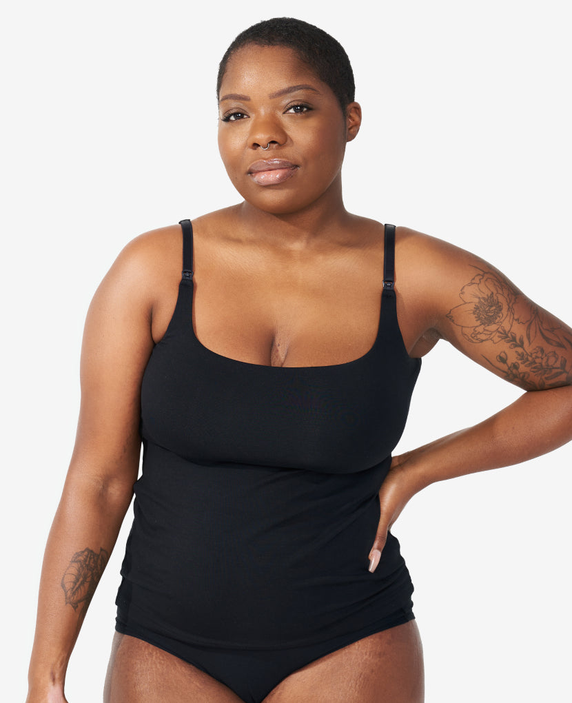 The Always-On Nursing Tank is your 24/7 go-to for easy feeding, maximum comfort, and modern styling.  Savonne is size 36DD and wears size Medium. Shown in Black.