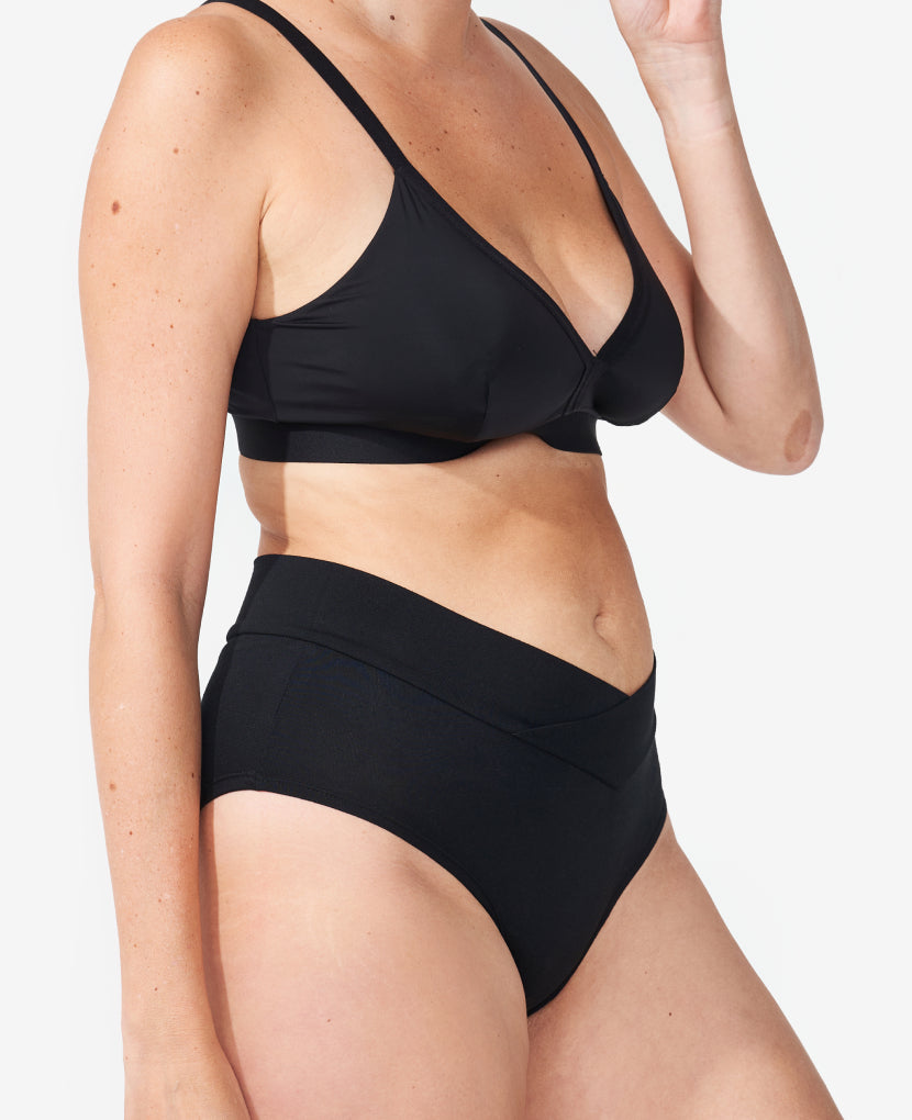 Elastic-free waistband can be worn higher on hips for a more dramatic V-shape. Mid-rise still comfortably clears a C-section incision. Danielle wears a Small in Black.