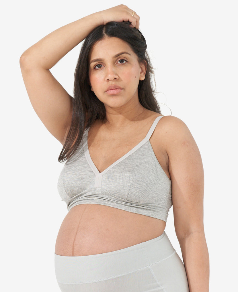 Designed to comfortably fit your body from pregnancy through every stage of breastfeeding and beyond. Diana, 36B, is 38 weeks pregnant and wearing a size M in Grey Marl.