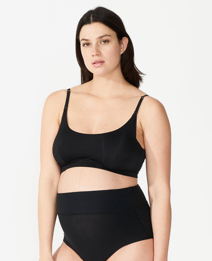 Named “Best Maternity Bra” by InStyle, this Stage 1 pregnancy-through-postpartum bra – with clip-down easy nursing access – is the ultimate in comfort. Nicole, size 36DD, wears a L in Black.