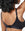 Adjustable straps and extended back closure with five rows of clasps for ultimate flexibility. Yanni is size 34DD and wears size Medium in Black.