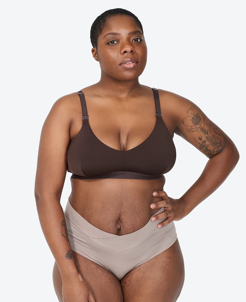 Sizes L and XL feature thicker straps for comfort. The V-shaped neckline and smoothing fabric layer easily under clothes. SaVonne wears a L in Java
