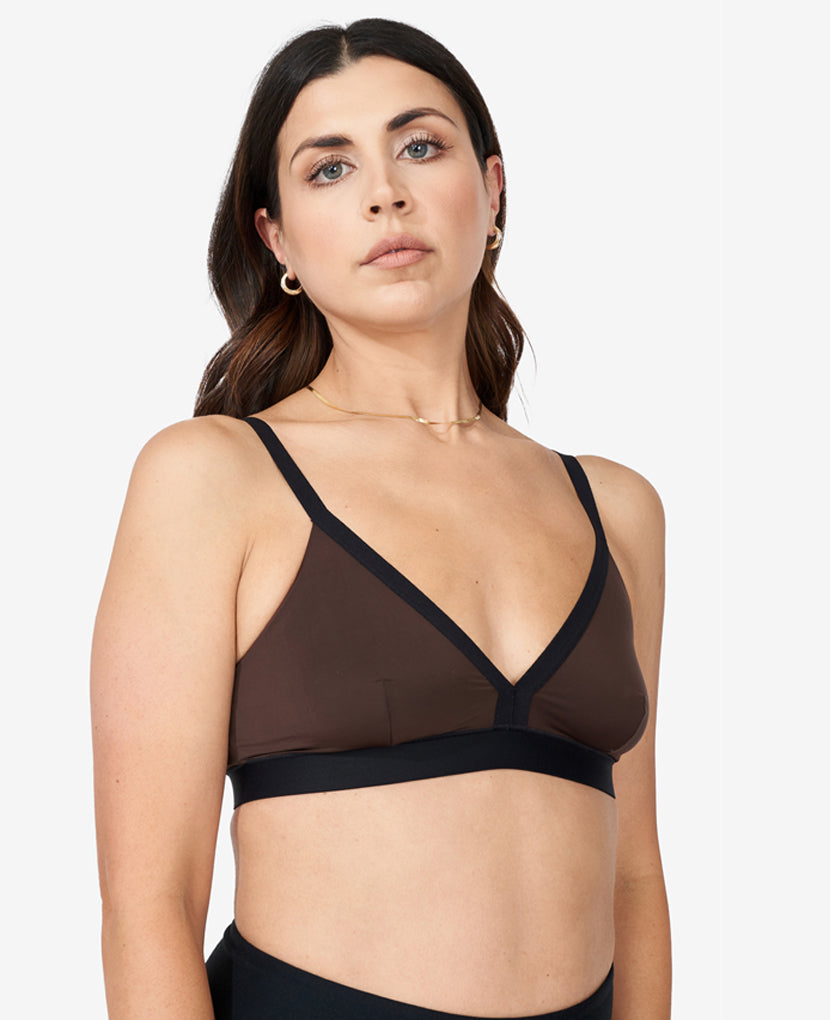 Our original plunge neckline and triangle shape now offered with Stage 2 support. Melissa is size 34B and wears size Small in Java.